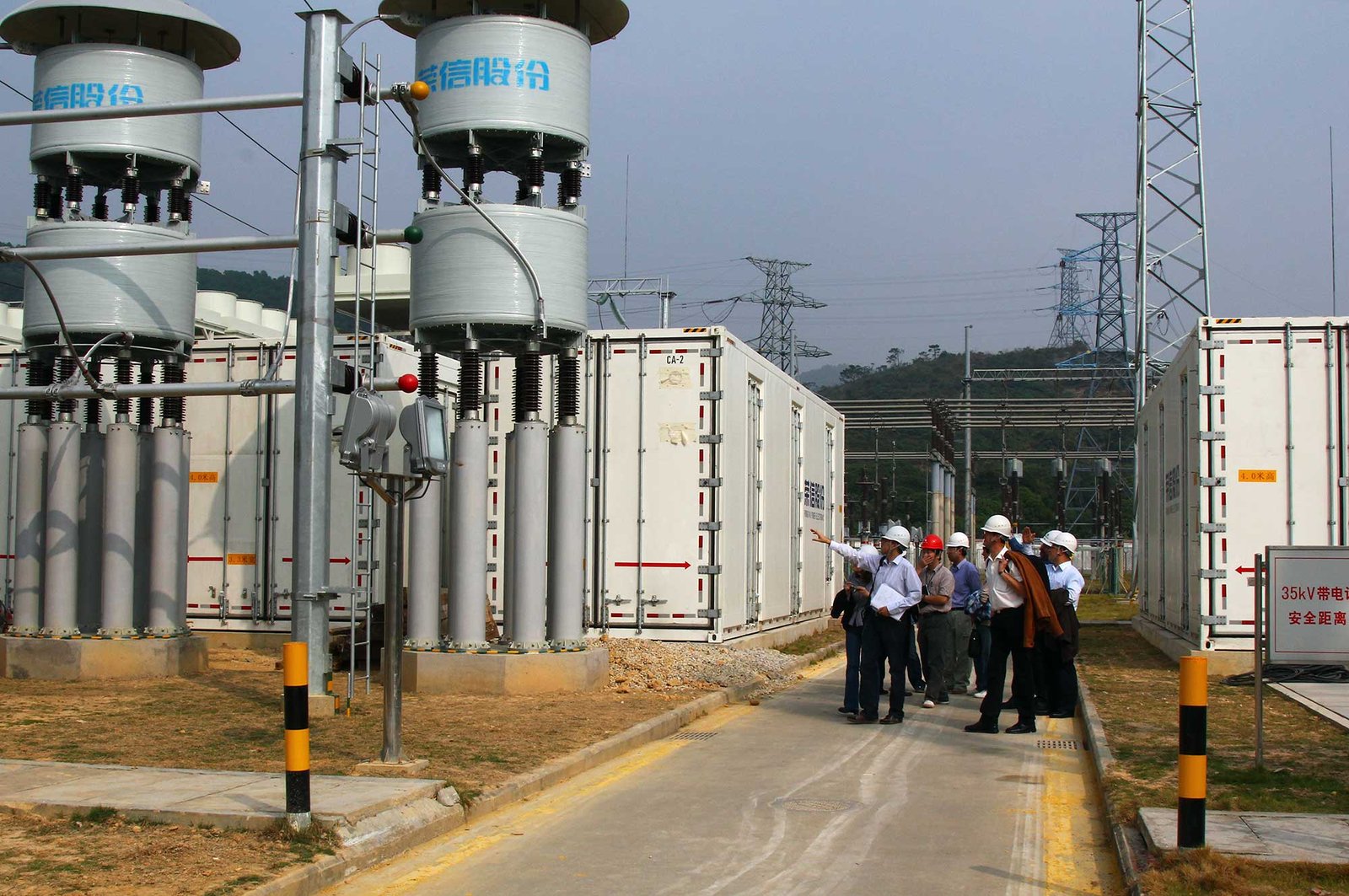 Industry Partnerships - group on-site discussing an installation